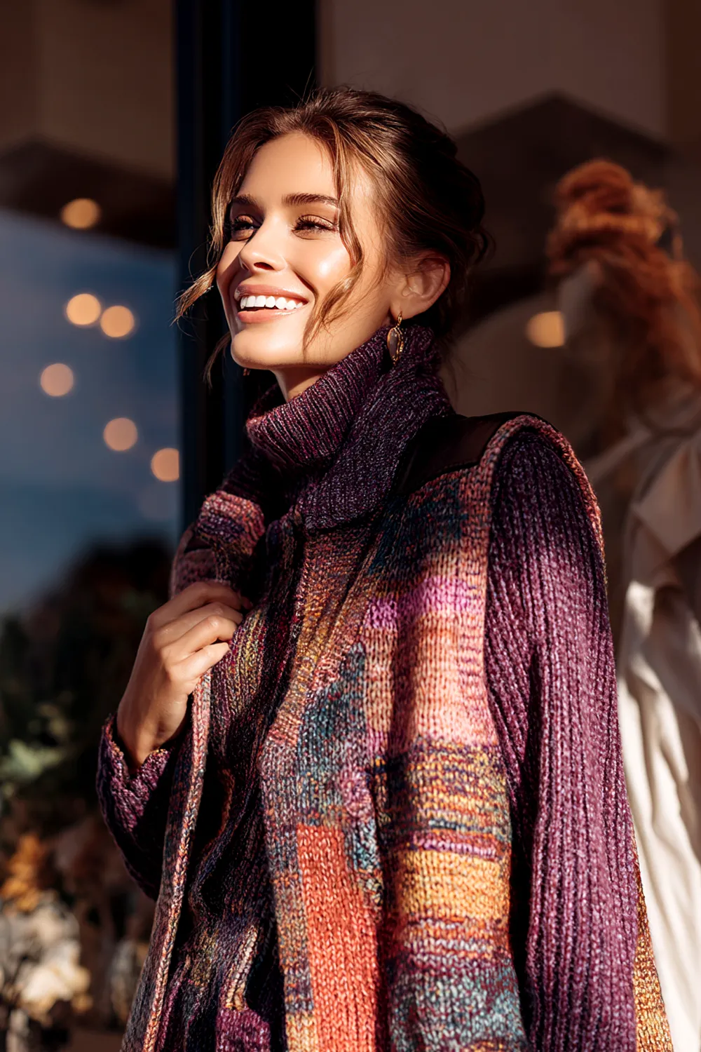 Woman in oversized plaid coat and slim jeans posing in natural winter street style
